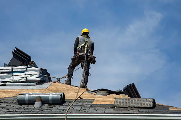 Professional Gutter Installation technician working in Houston, PA